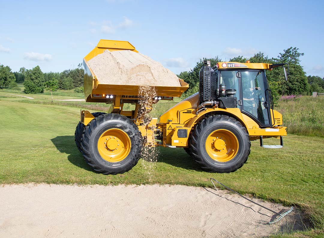 912G HM MT Unloading In Golf Course Bunker